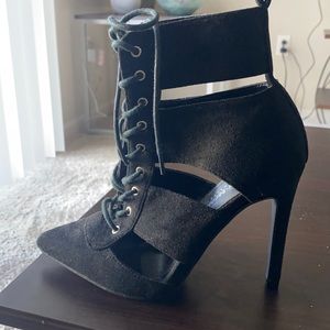 Closed toe black bootie heels